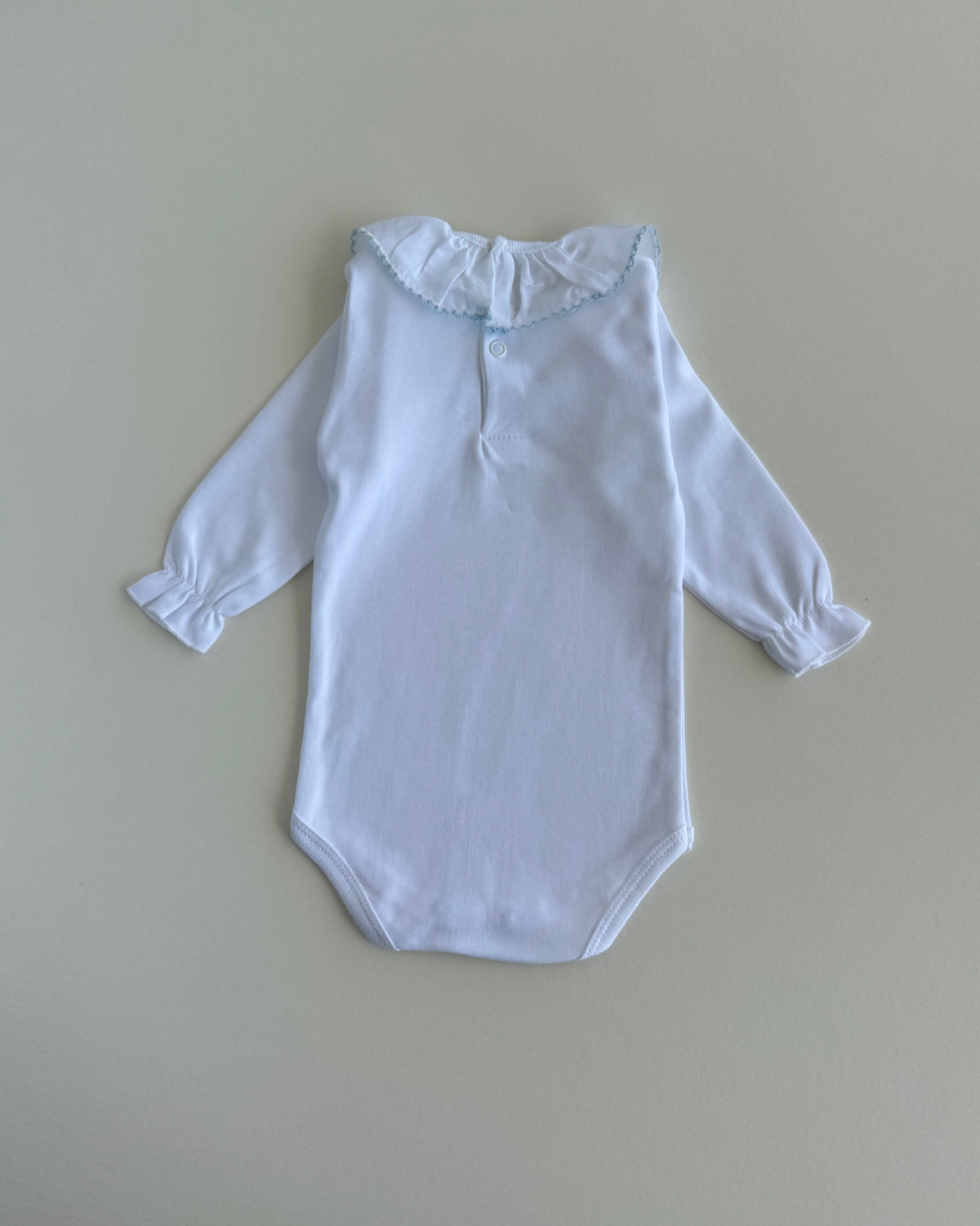 Coimbra Ruffle Collar Bodysuit